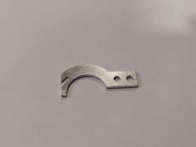 Clutch actuator spring tab